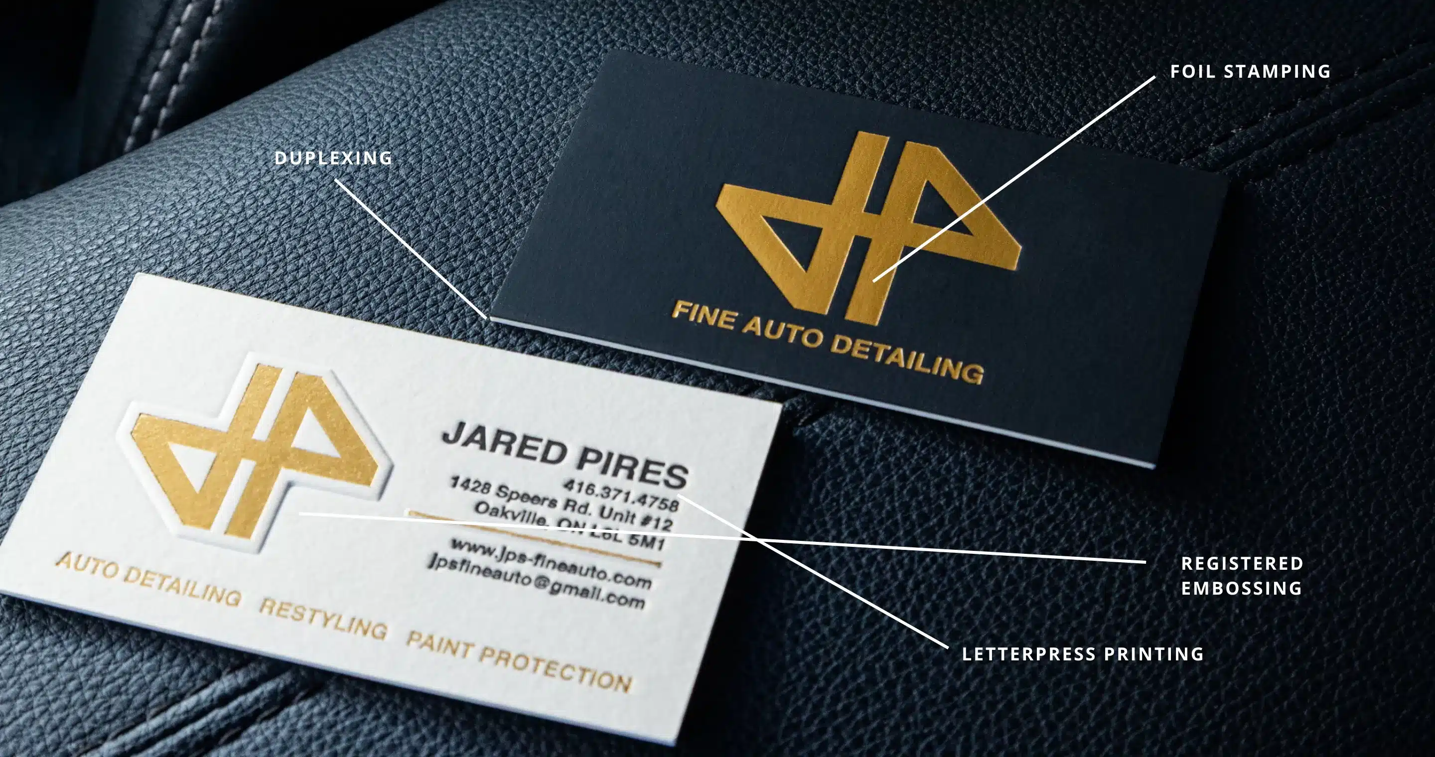 Two business cards for "Fine Auto Detailing" and "Jared Pires" displayed on a textured black surface with labels.